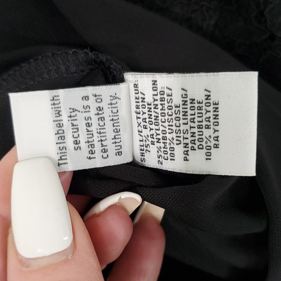 Diane Von Furstenberg Tillie Black Romper Lace Slinky Material Wrap Pockets SZ 8 - Picture 11 of 12